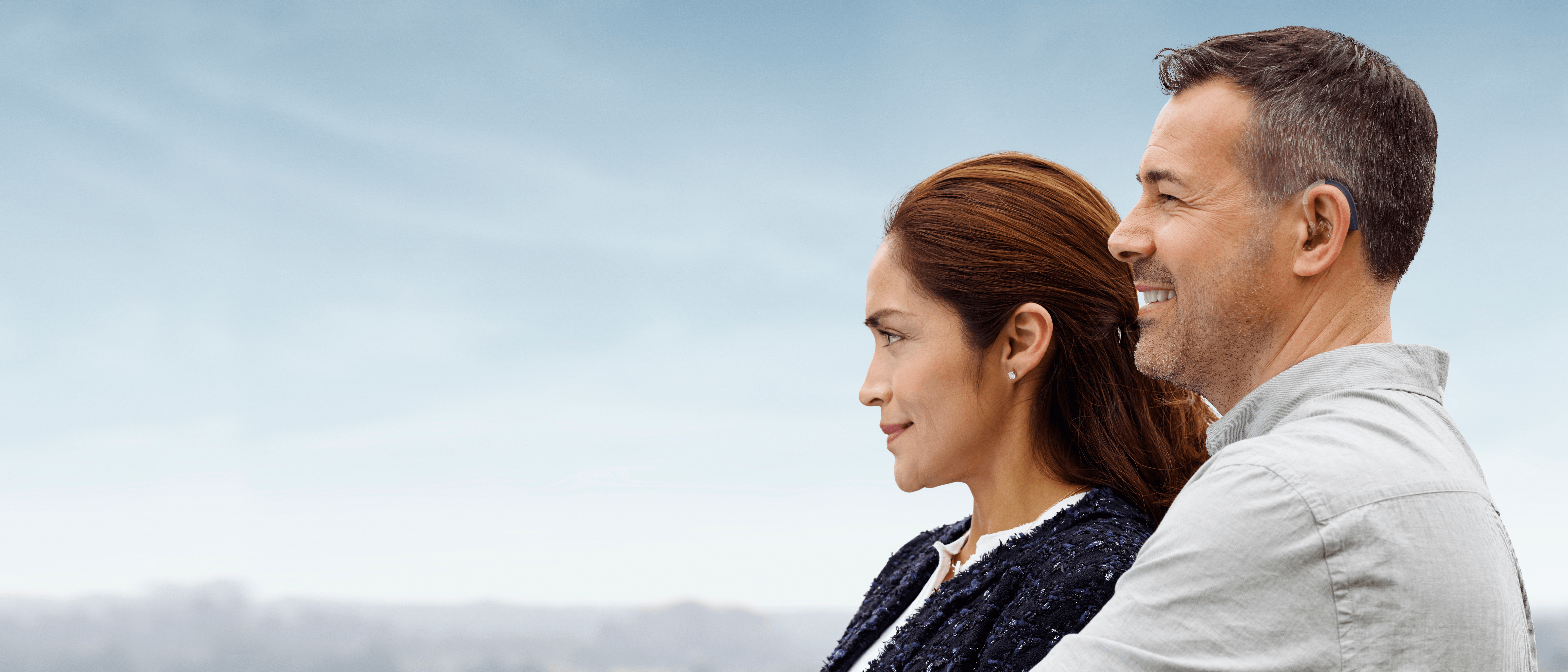 beltone boost max hearing aid user in profile with wife