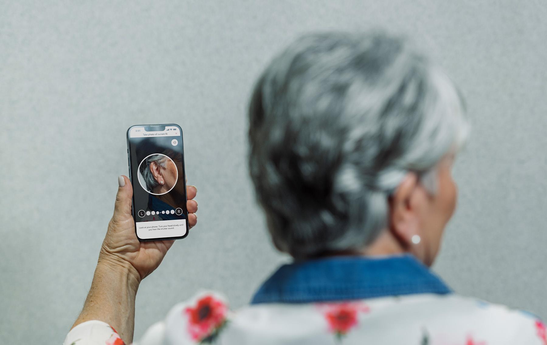 Beltone_Achieve_woman_trainstation