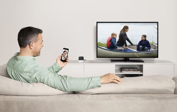 Beltone Boost Max hearing aid user using facetime