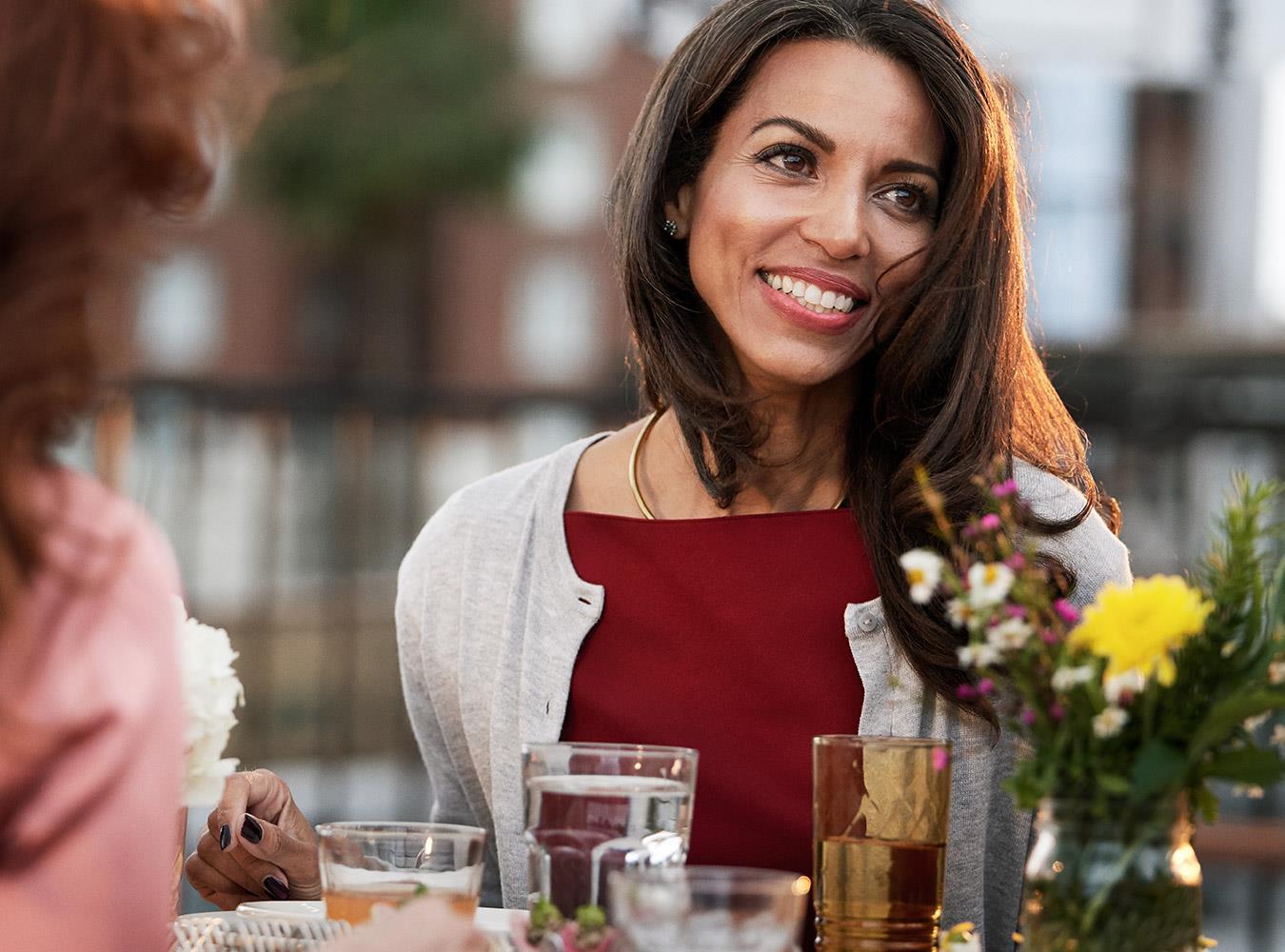 Lady smiling with clearer speech using ReSound LiNX Quattro