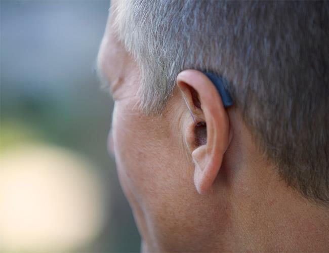 Man wearing ReSound Verso hearing aid
